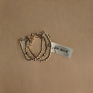 Anne Klein 3 goldtone braclets